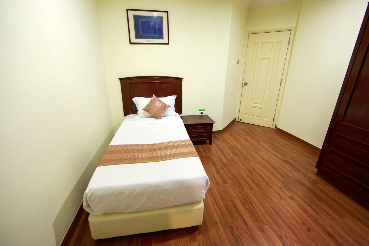 Beta Service Apartment Labuan Szoba fotó