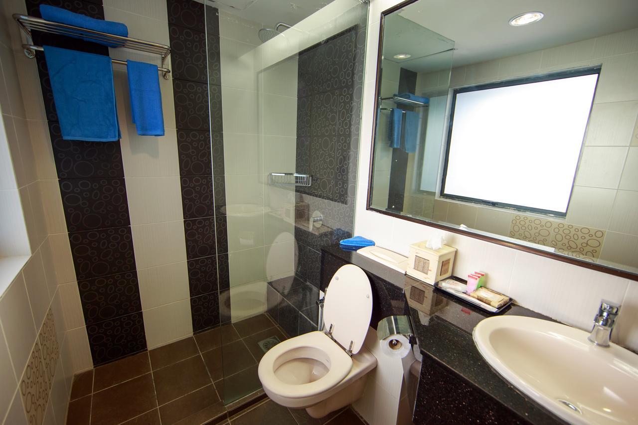 Beta Service Apartment Labuan Szoba fotó
